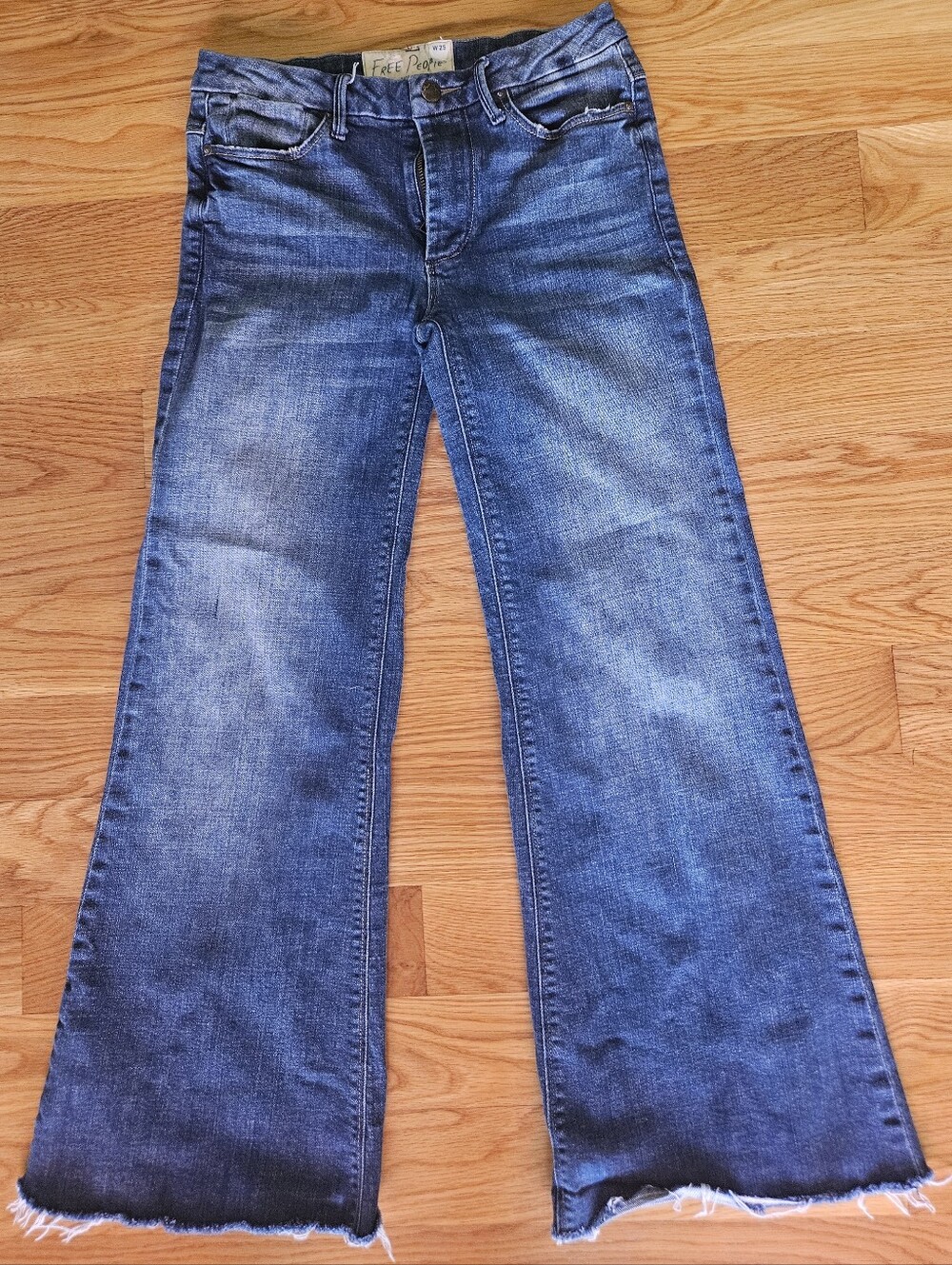 Free People Medium Blue Flare Jeans with Raw Hem